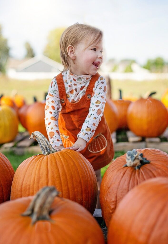 girl, pumpkins, pumpkin patch-8287665.jpg